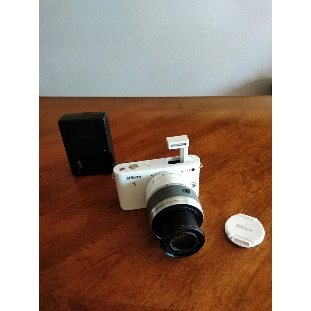 READ* Nikon 1 J1 White Digital Camera with 1 NIKKOR 10-30mm VR Lens